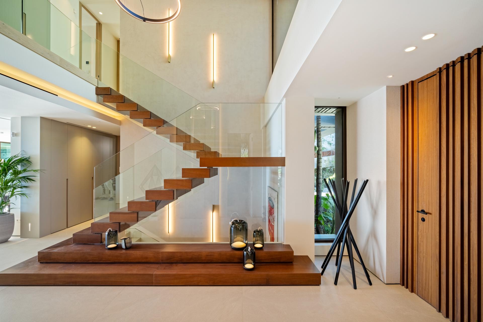 Living room with full-height glazed facade and tile flooring, 5-bedroom villa, La Quinta