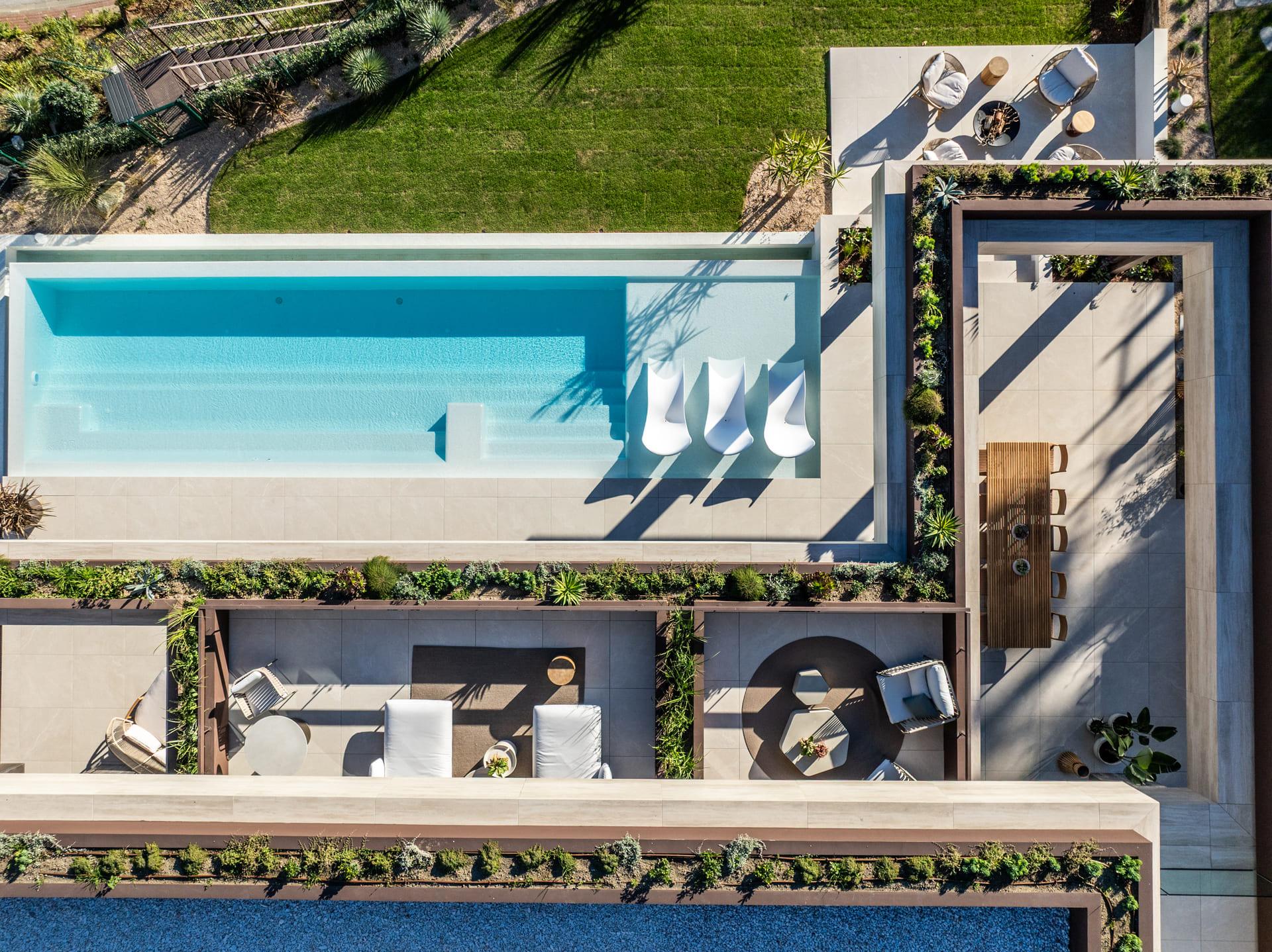 Rear garden and pool terrace, new-build villa, La Quinta, Benahavis
