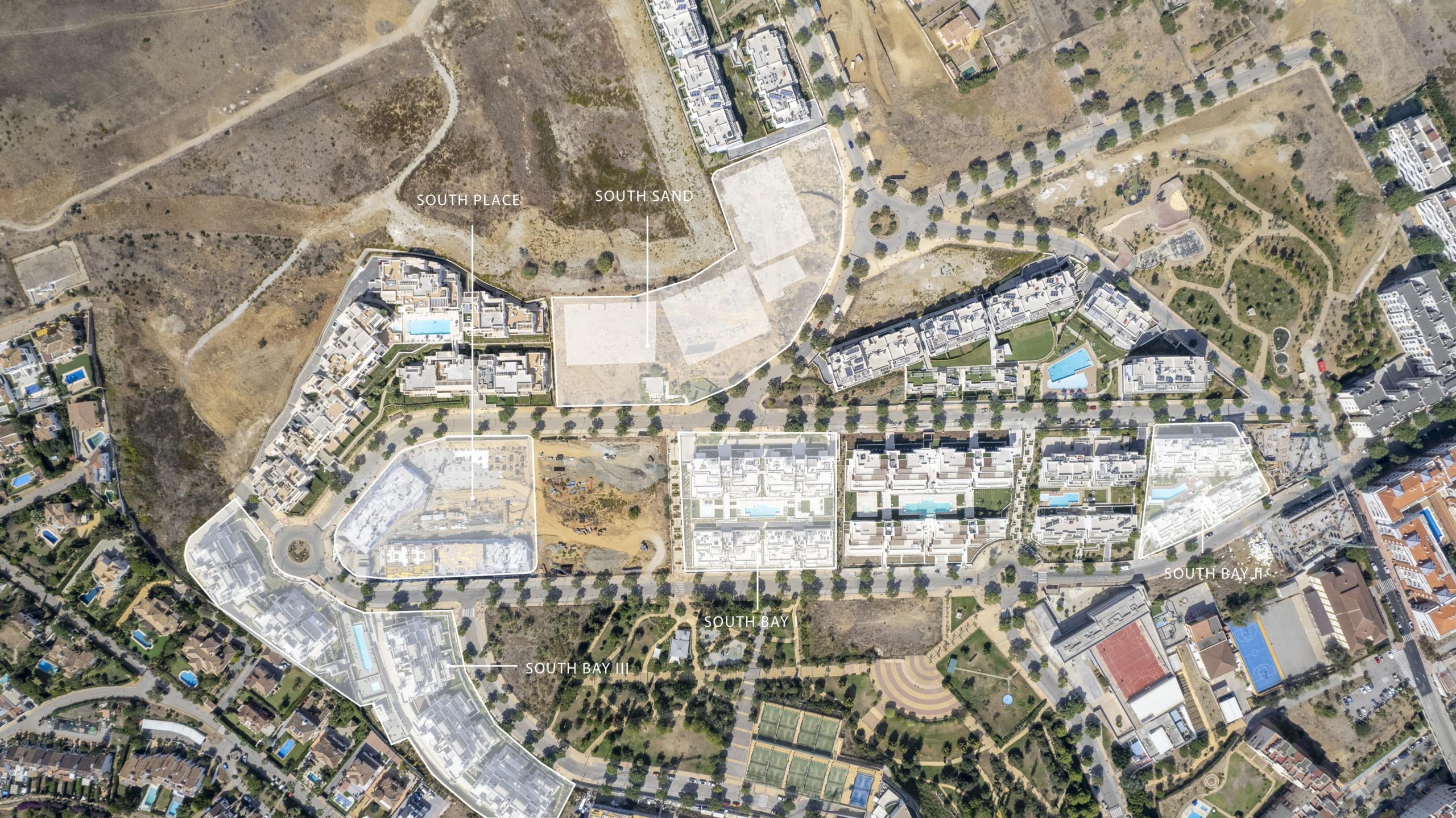 Aerial view of three-storey new-build penthouse development, Las Mesas, Estepona
