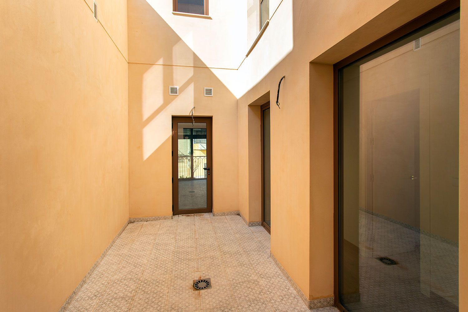 Shared stairwell inside new-build block, Pueblo 6