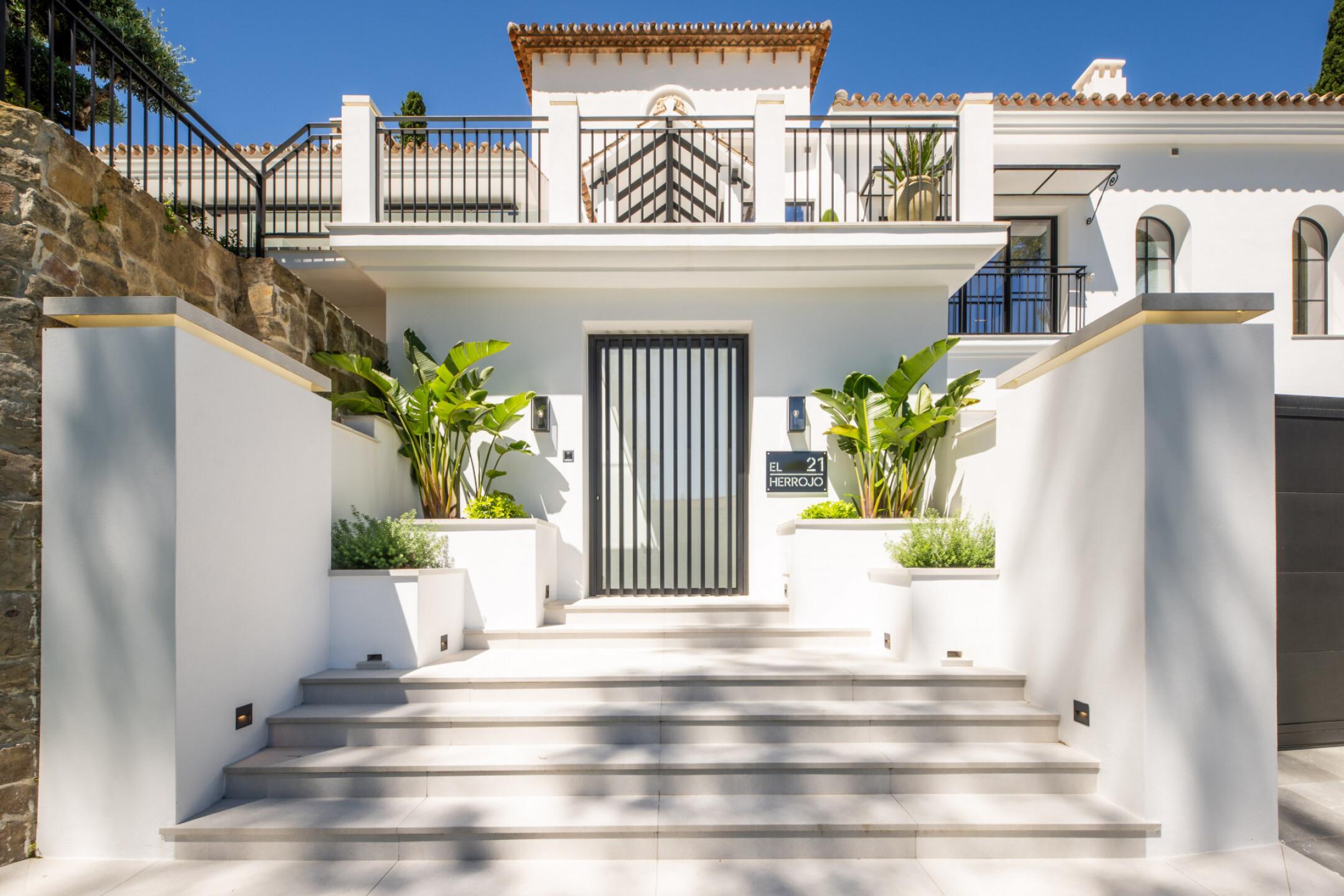 Private pool and terrace at dusk, new-build villa, La Quinta, Benahavis