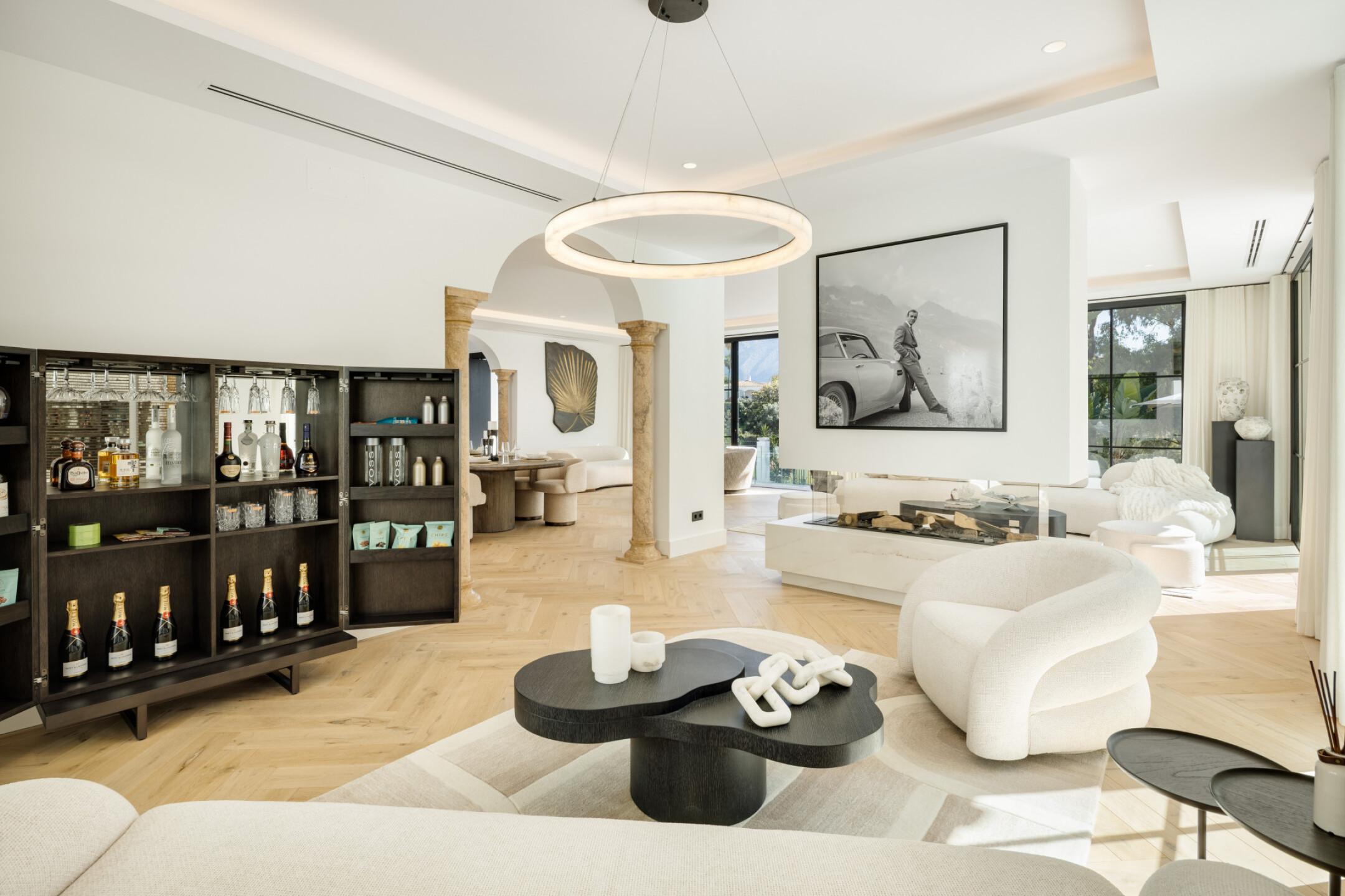 Master bedroom with large windows in new-build villa, La Quinta, Benahavis