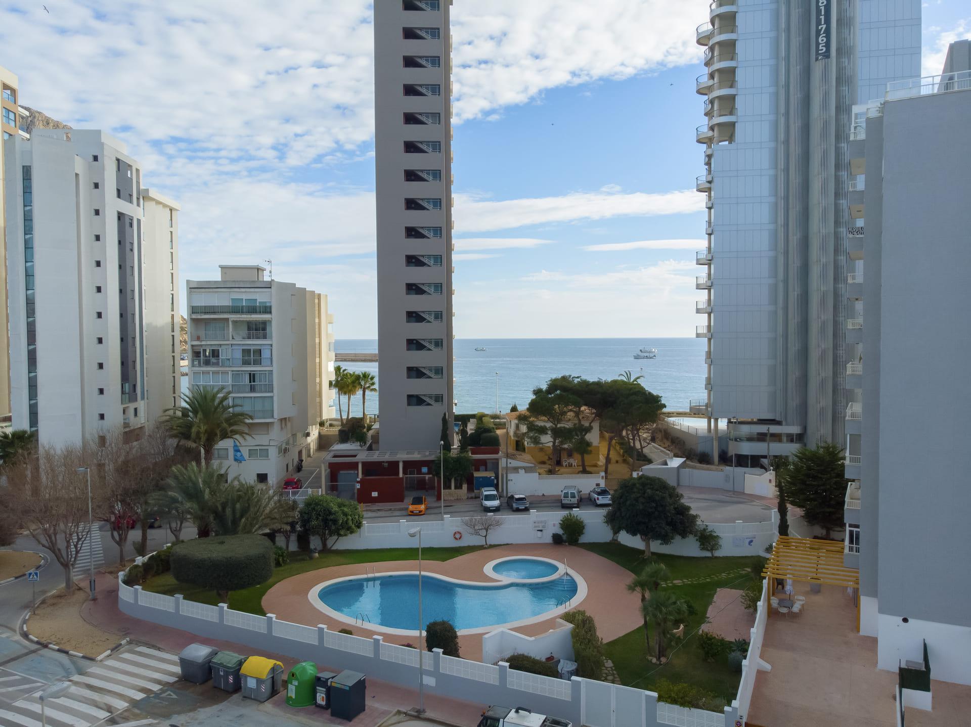 Living area with floor-to-ceiling windows in 3-bedroom apartment, Ifach, Calpe