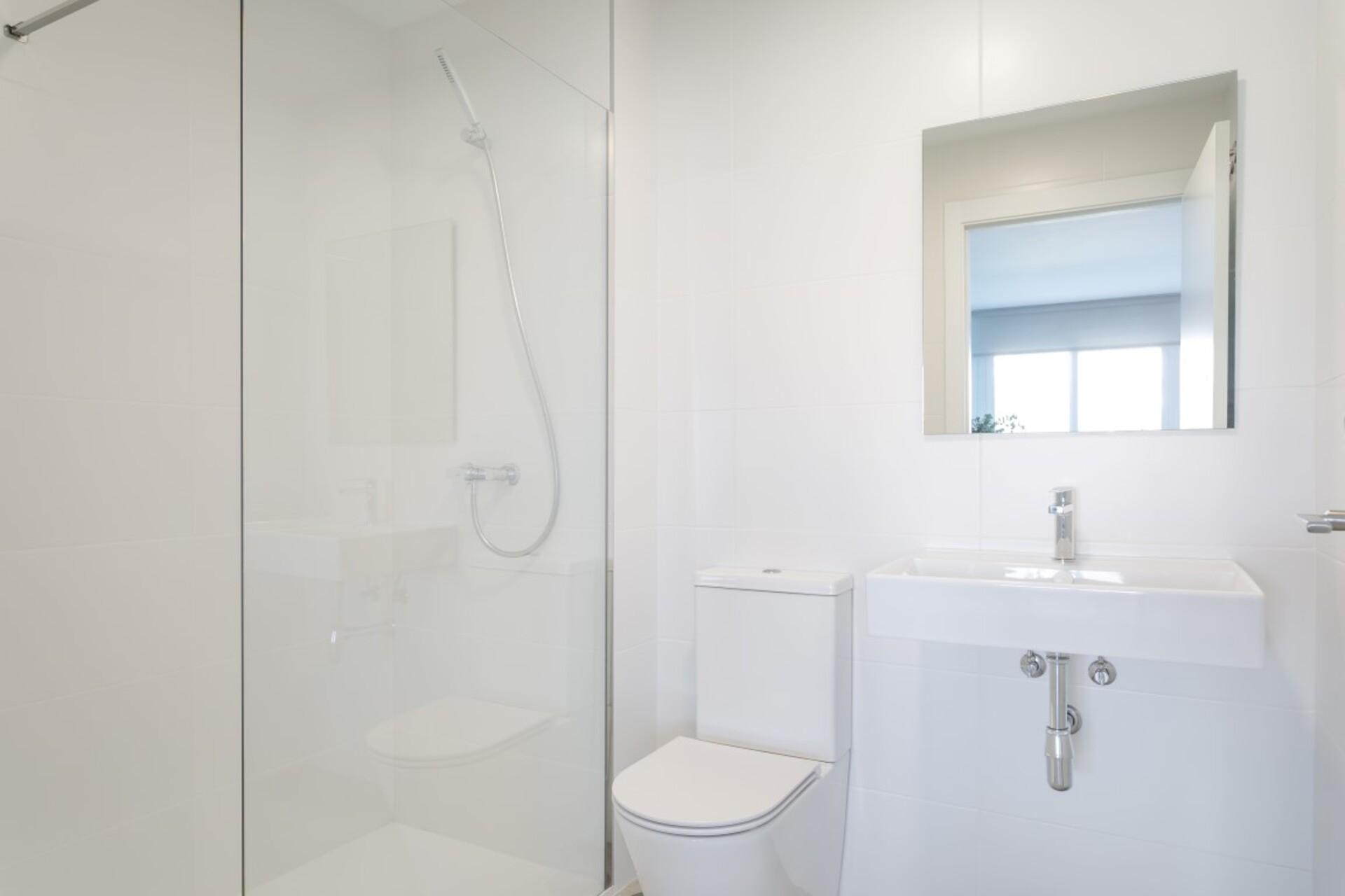 Pool surround and landscaped communal grounds, Balcón de Finestrat development