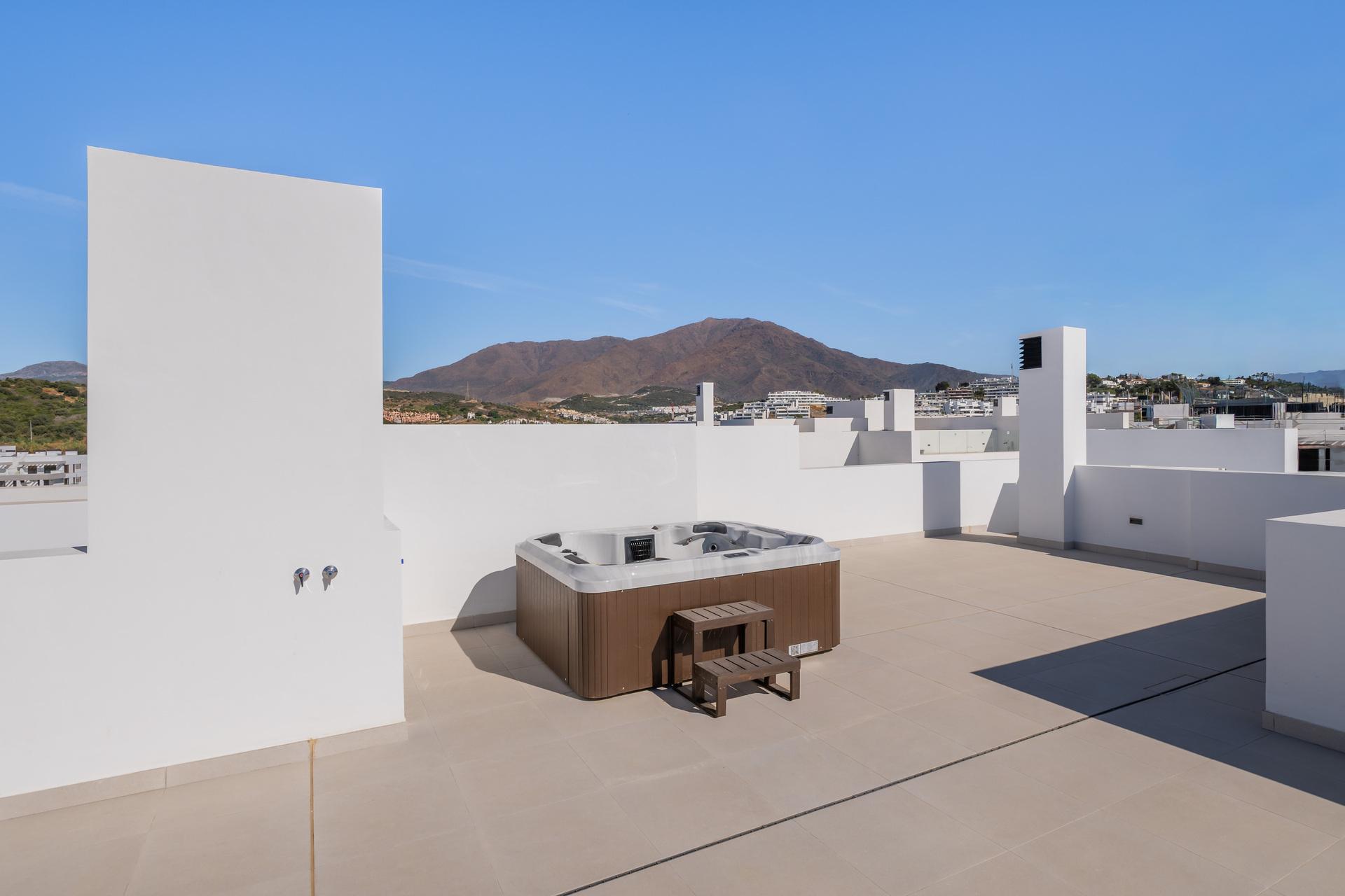 Solarium terrace with open views, new-build development, Arroyo Vaquero
