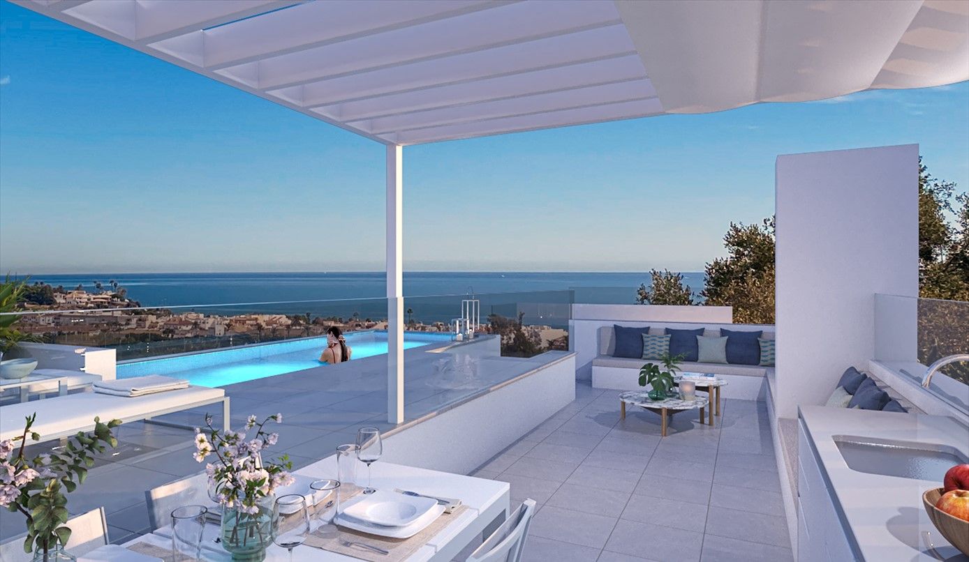 Communal pool and sunbathing terrace at new-build development in La Cala de Mijas, Mijas