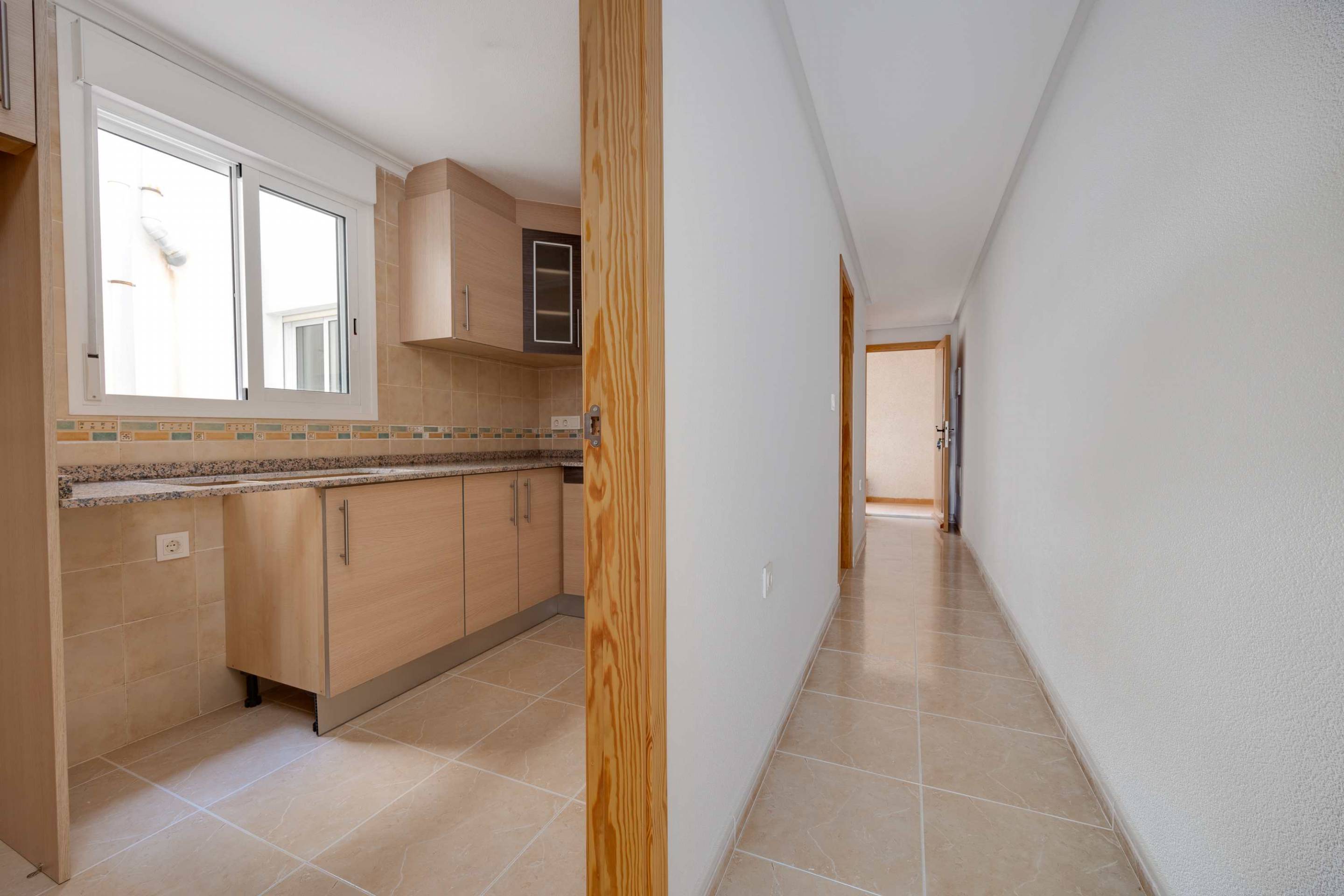 Internal hallway of apartment building in San Fulgencio Pueblo