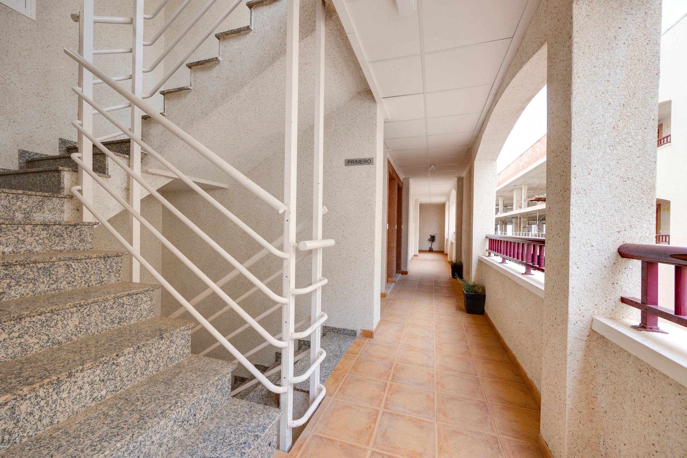 Communal stairwell in new-build building, San Fulgencio Pueblo