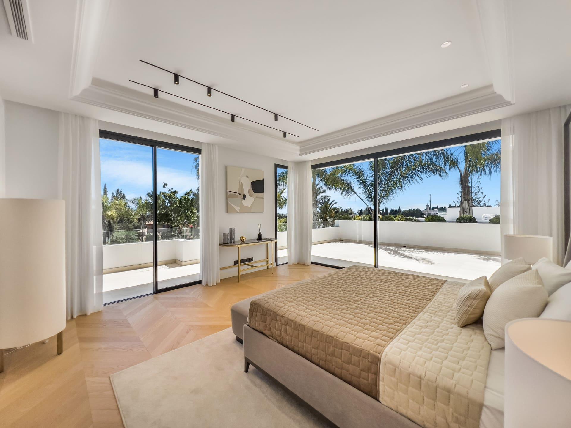 Side elevation showing exterior cladding, new-build villa, Las Lomas de Río Verde, Marbella