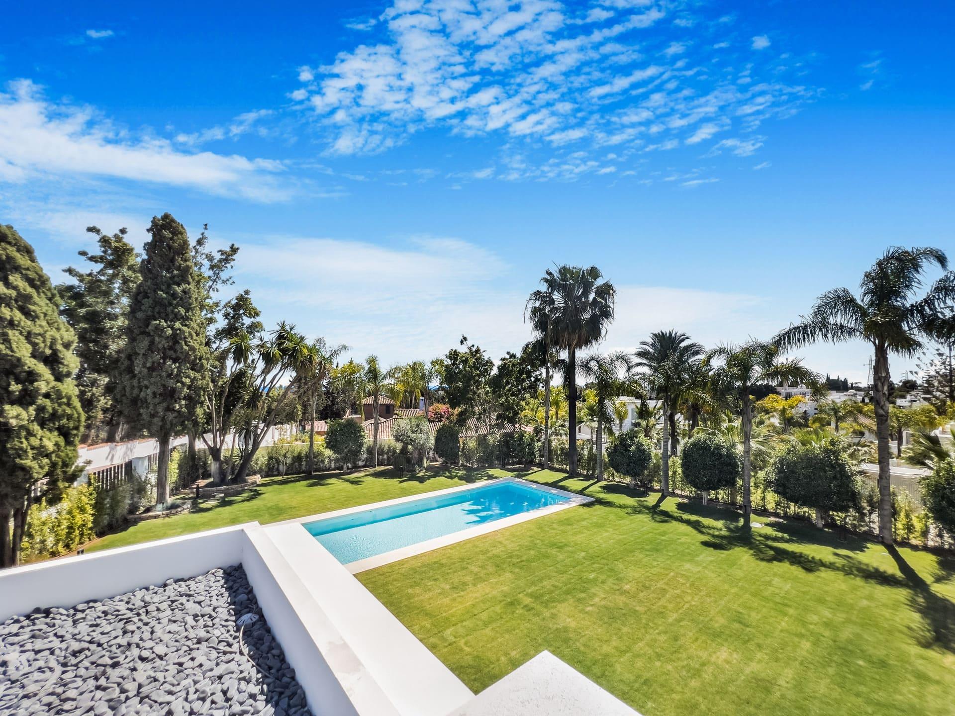 Private pool at dusk with exterior lighting, 6-bedroom villa, Las Lomas de Río Verde, Marbella