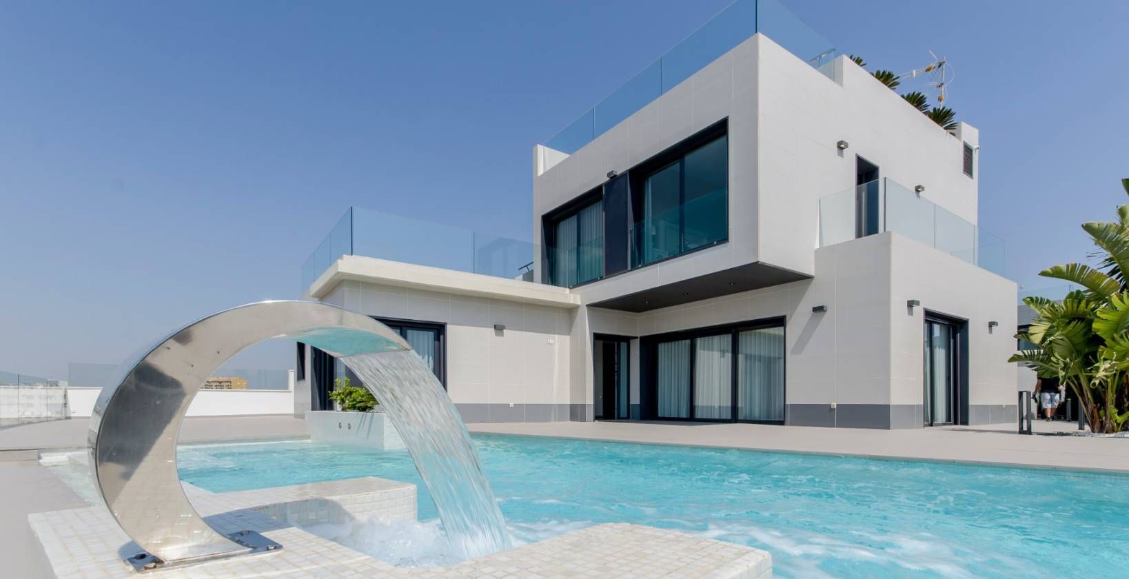Kitchen island and integrated appliances in new-build villa, Campoamor