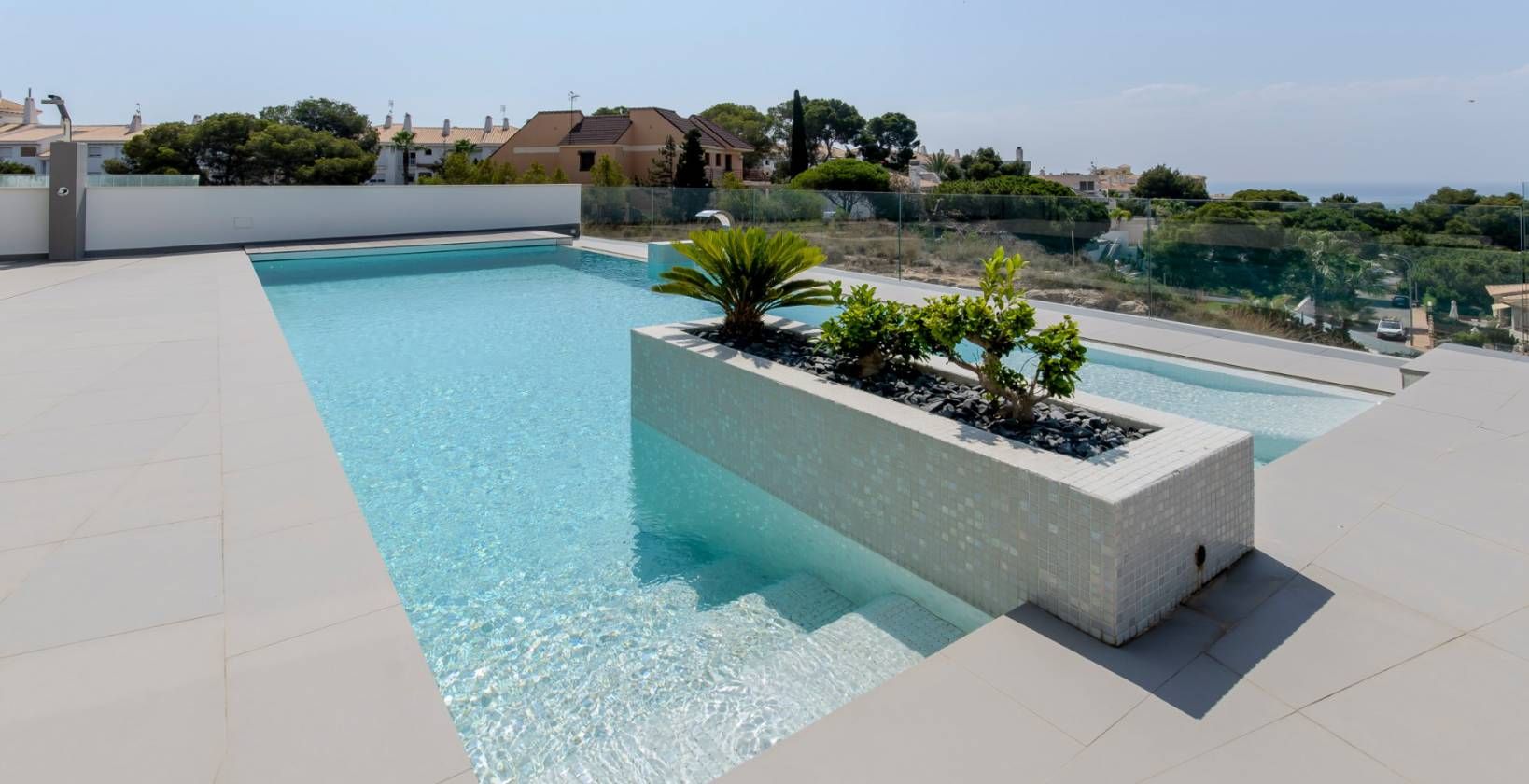 Rear garden and exterior terrace of new-build villa on 500m2 plot in Campoamor