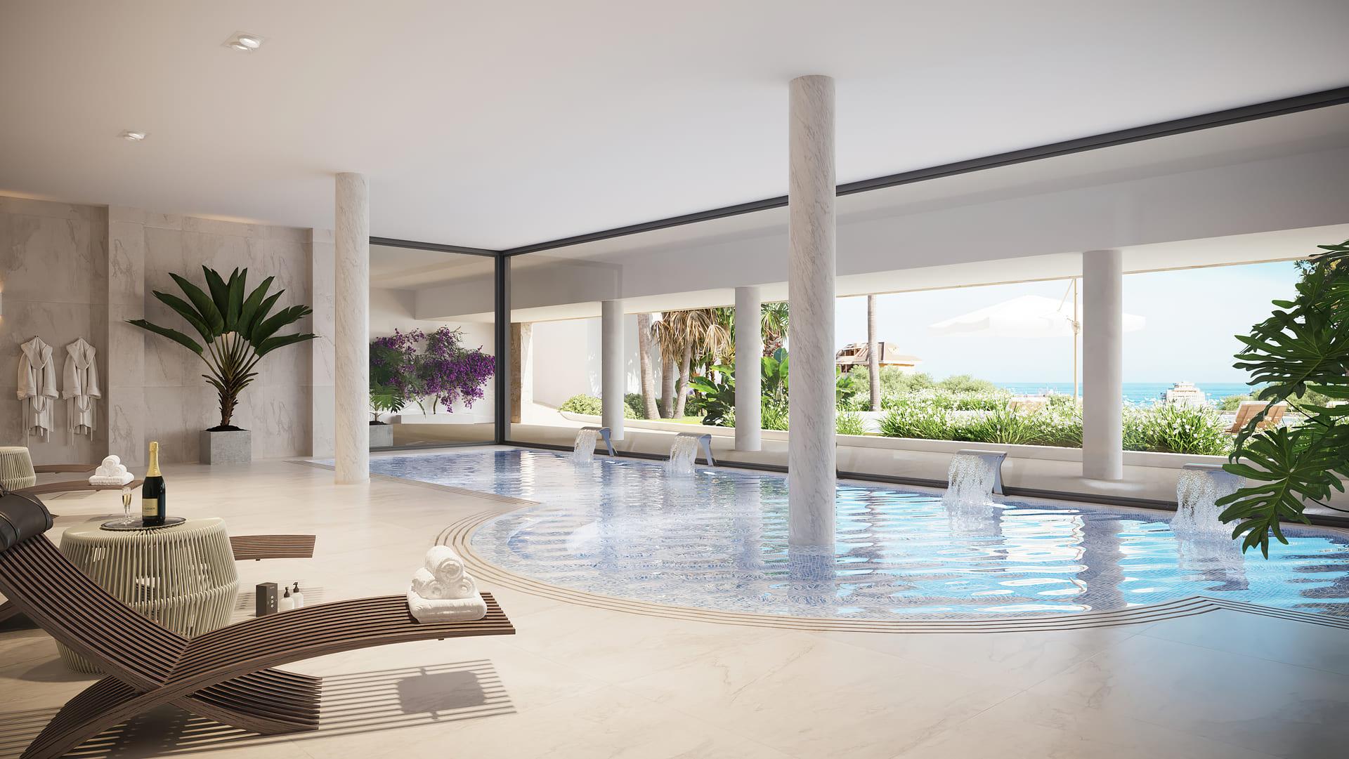 Poolside sunbathing area with paved surround in new-build development, El Higuerón
