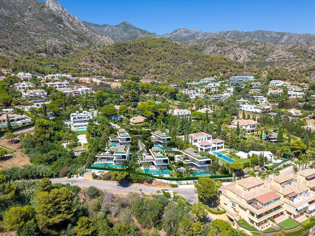 Aerial view of villa roofline and landscaped garden, Cascada de Camojan, Marbella