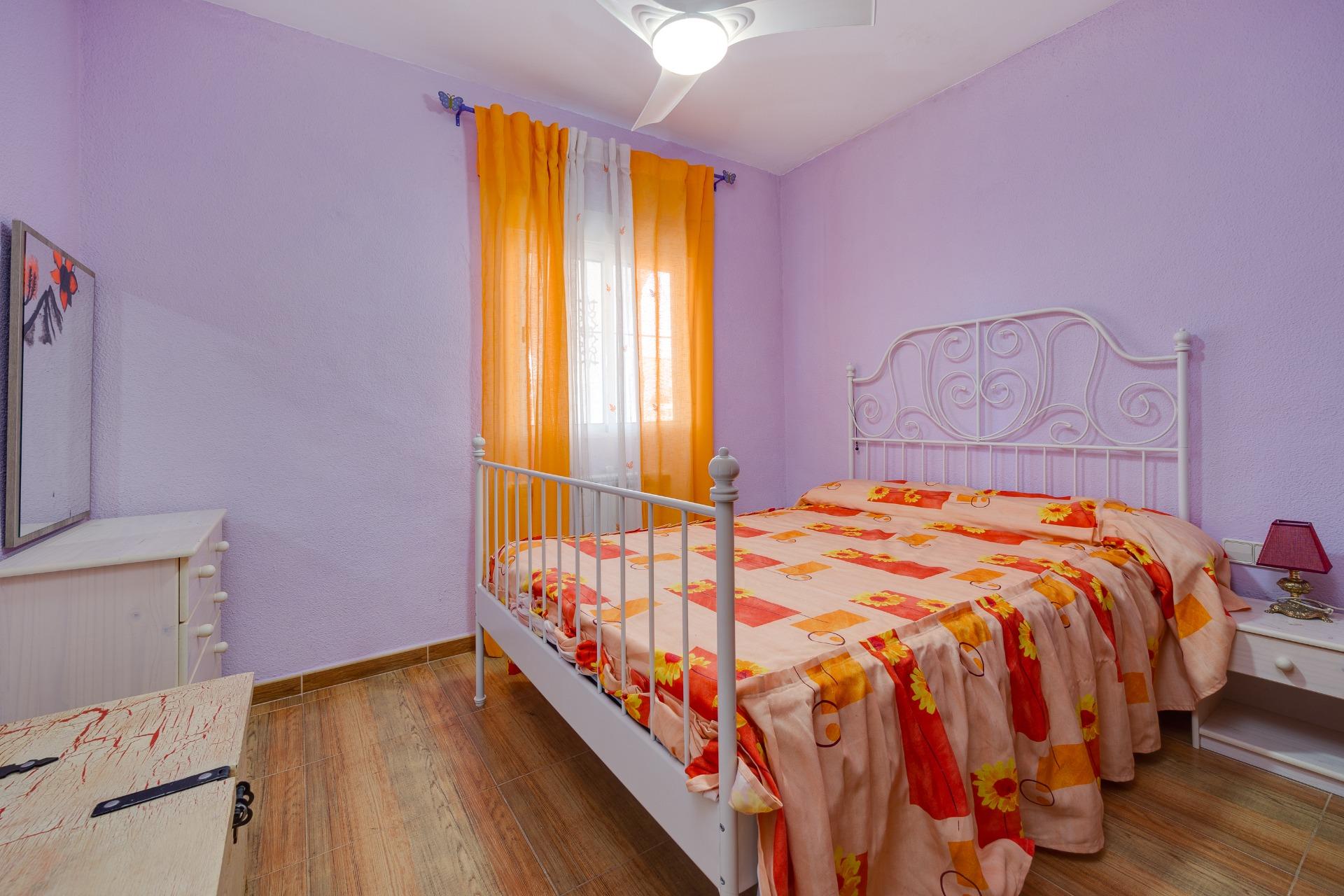 Third bedroom with window overlooking the garden